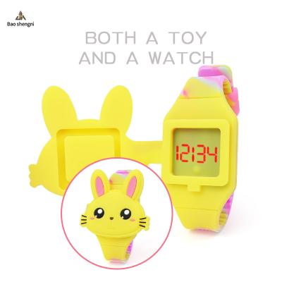 China New Auto Date Fashion Silicone Led Camouflage Watch Stirring Person Strap Led Electronic Watch Cute Rabbit Cartoon Kids Watch For Children for sale