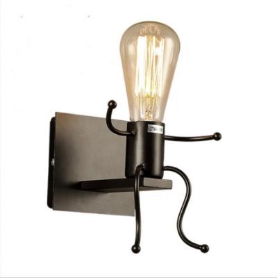 China Indoor simple black diagonal hotel wall lamp iron cone iron visual wall lamp for sale