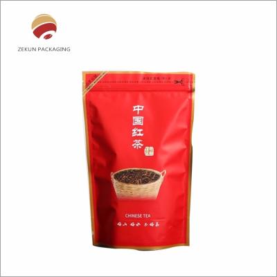 China Custom CMYK / PANTON Printed Waterproof Vacuum Sealed Tea Packaging Paper Bag for sale