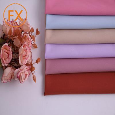 China Wrinkle Resistant Bi-stretch Twill Style Recycled Polyester TR Cheap Matching Fabric For All Seasons for sale