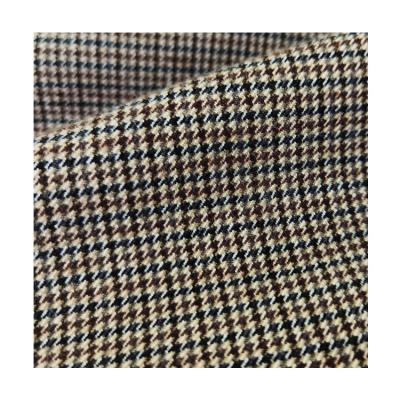 China Wrinkle resistant winter yarn dyed flannel raymond suiting fabric TR spandex 370gsm wool fabrics suits women suits ladies pants suits for sale