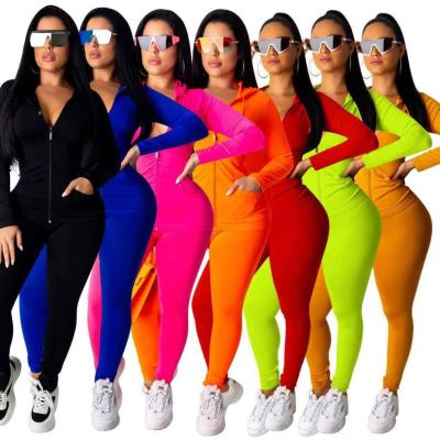 China 2021 Women Clothing Solid Color Hooded Two Piece Set Top Casual Sportswear Breathable Long Pencil Pants Zipper Sleeve Knitting Skinny Set for sale