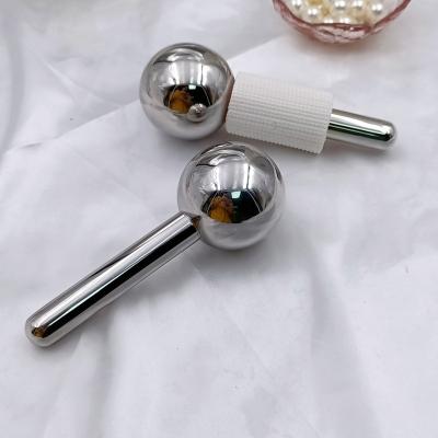 China Penetrate Stainless Steel Hot Cold Eye Massage Remover Face Massager Beauty Compress Circle Massager Skin Care Metal Ice Black Globes for sale