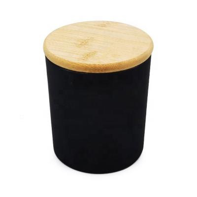 China Household Custom Logo Wholesale Bamboo Lid 3.5OZ 8Oz Frosted Glass Matte Black Candle Jars 100ml 250ml Making Jar Glass Bottle for sale