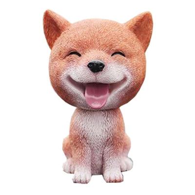 China Europe Resin Lovely Car Head Decoration Handmade Dog Flip Nodding The Resin Puppy for sale