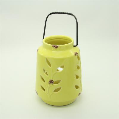 China Eco - Friendly / Hollow Design Ceramic Hanging Lantern With Led Light Sconce Ceramic Lantern Outdoor Garden Decoration for sale