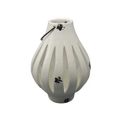 China New Design White Design Hollow Ceramic Oil Burner Candle Holder Lantern Eco - Friendly / Hollow Hanging Lanterns for sale