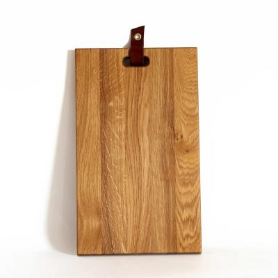 China Kitchen Design Sustainable Elegant Nordic Oak Wood Panel Cutting Boards For Mum With Leather For Hanging for sale