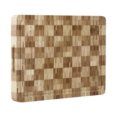 China Viable Engrave Logo End Grain Extra Large Premium Bamboo Wooden Cutting Board With Handle for sale