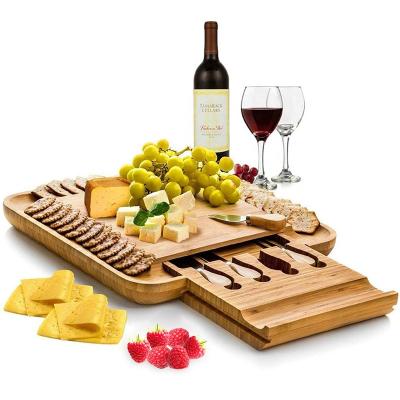 China Sustainable Wholesale Charcuterie Bamboo Cheese Cutting Board Set With Cheese Knives Set for sale