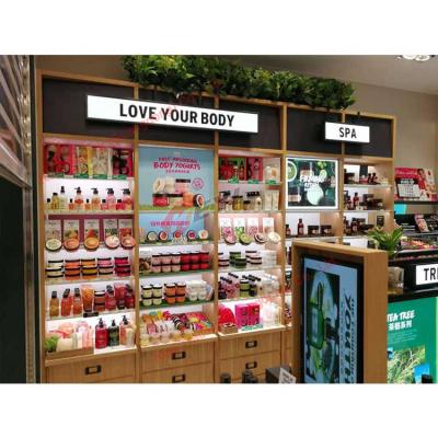 China Customized Cosmetic Wall Display Stand Shopping Mall Showcase Retail Perfume Store Furniture Cosmetic Display Cabinet for sale