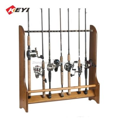 China Custom Single Siede Solid Wooden Fishing Rod Display Rack For Retail for sale