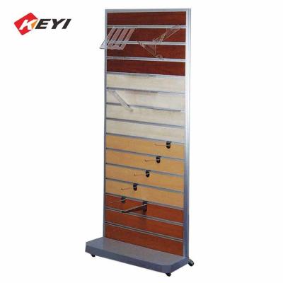 China Multi-Function Floor Retail Display Rack Wood Slat Wall Display With Hooks for sale