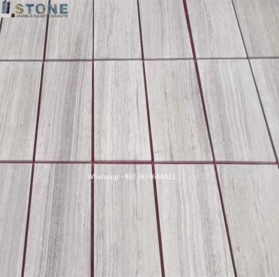 China Foshan Modern White Wood Marble For Flooring And Projects for sale