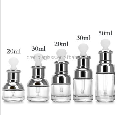 China Healthy Cosmetic Packaging 20ml/30ml/50ml Clear Glass Bottle Pump Lotion Bottle for sale