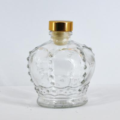 China Sustainable Crown Shape Custom Glass Scent Botol Diffuser 100ml Diffuser Bottle for sale