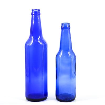 China Custom Beverage Beer Bottle 330 500 mlFlint Amber Cobalt Blue Glass Bottle With Crown Cap for sale