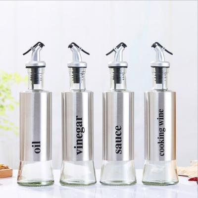 China Personal Care 300 500ml Stainless Steel Body Wine Cooking Oil Vinegar Soy Sauce Glass Bottles for sale