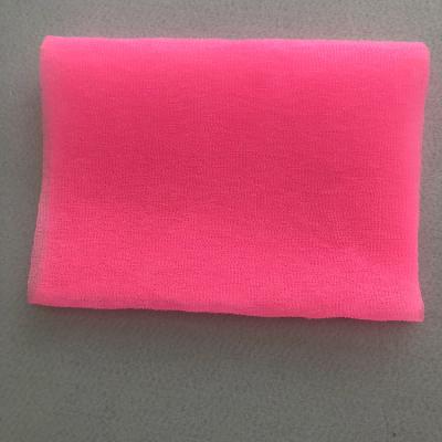 China Compressed White Color Exfoliating Face Cloth Scrub Body Cloth Scrub Wash Cloth for sale