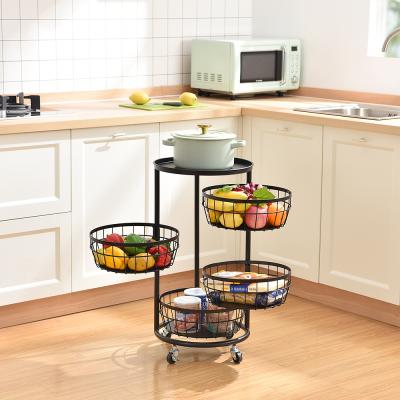 China Sustainable Kitchen Rotating Shelf 360 Degree Vegetable Storage Rack Multi Function Household Round Floor Fruit Baskets Shelf Wheels for sale