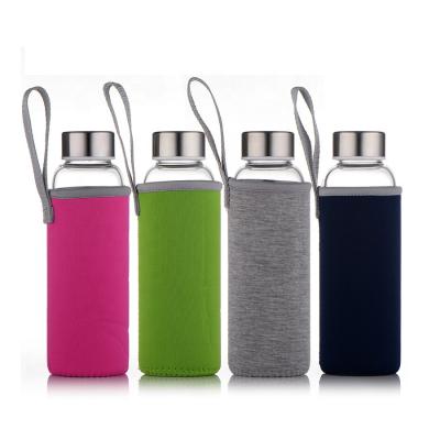 China Glass Water Bottle 18oz Factory Supply Glass Bottles for Beverages Juicer Leak Proof Caps with Carrying Loop à venda