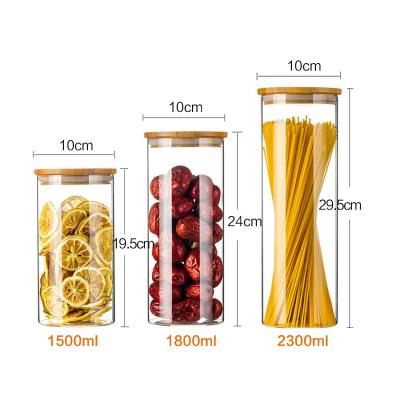 China Large Transparent Glass Storage Bottle with Bamboo Lids LHBG0022 250-500ml Te koop