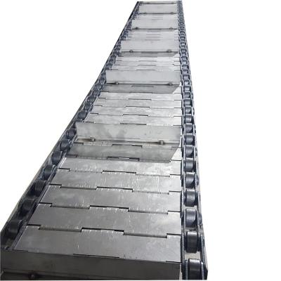 China Heat Resistant Baffle Chain Plate Cross Conveyor Belt Hoisting Conveyor Belt Scrap Iron Conveye for sale