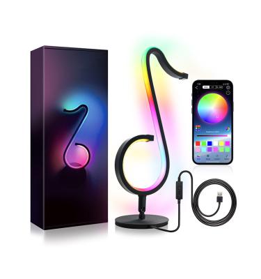 China Modern Creative Musical Notes RGB Symphony Atmosphere Lamp Bedroom Bedside Wall Lamp Table Lamp Night Light for sale