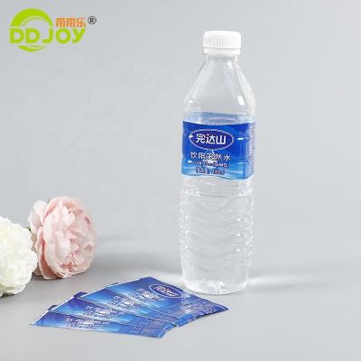 China Waterproof Blue Environmental PVC Shrink Bottle Label For Mineral Water Drink Bottle for sale