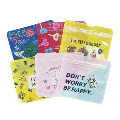 China Lovely Color Moisture-proof Cartoon Laser Zipper Self-Sealing Bag For Cosmetic Gift Toy Candy Food Package for sale