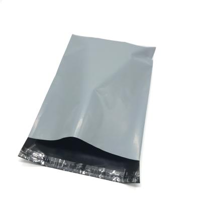 China 100pcs Courier Mixed Plastic Strong Postal Packaging Polythene Gray Mailing Bags for sale