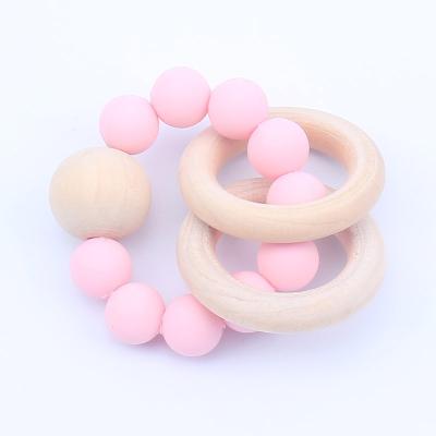 China PVC Baby Free Silicone Teether Ring Chewable Bracelet Multi Color Beads Clips Silicone Toy Teething Shower Wooden Pacifier for sale