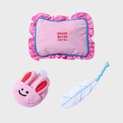 China Stocked Popular Pet Products Dog Game Bite Chew Toy Squeaky Pink Pillow Rabbit Slipper And Molar Teeth Chew Toy for sale