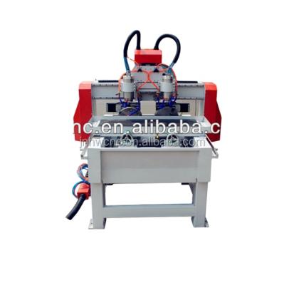 China Advertising company 6090 4 axis cnc router machine for wood engraving and carving in lower price for sale