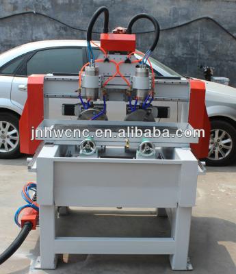 China Double Heads CNC Engraving Machine Specially Stone Rotary Wood Cylinders Engraving 3d CNC Carving Machine SW-3035 for sale