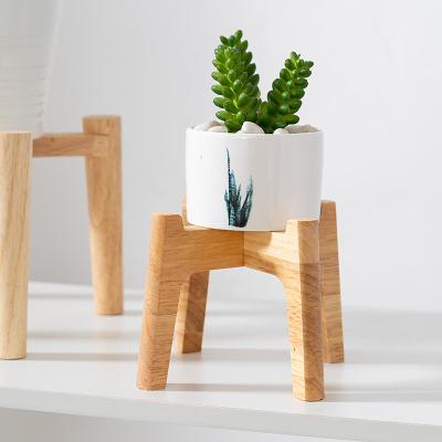 China Modern Home Decoration Outdoor Custom Mini Flower Garden Ceramic Plant Pot With Wooden Stand for sale