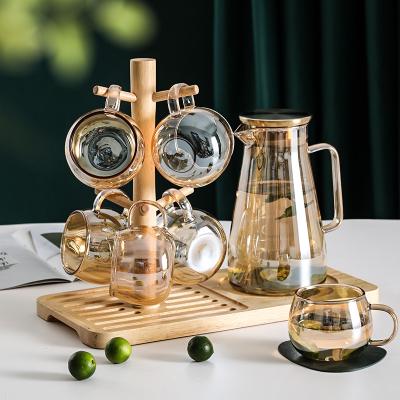 China Stored Eco-friendly Glass Water Jug Set Pressure Spout Jar With Glass Pitcher Cup Set for sale