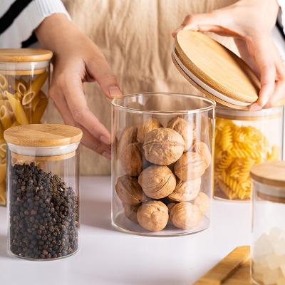 China Stored glass sealed jar with wooden lid for sale