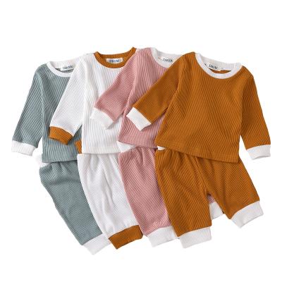 China 2022 Custom Cotton Logo O Set Baby Springs 100% Simple Baby Clothing Set Two Piece Anti-Shrink Neck Fits Baby Clothes for sale