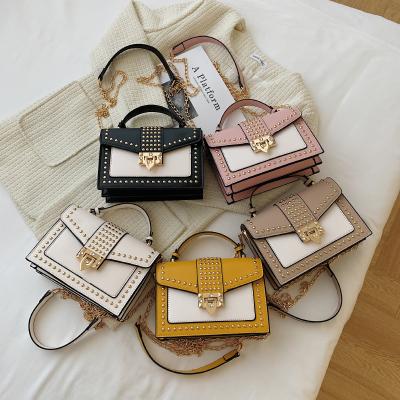 China Fashion 2021 Latest Girls Handbags Popular Young Lady Fashion Handbags Woman rivets purses for female for sale