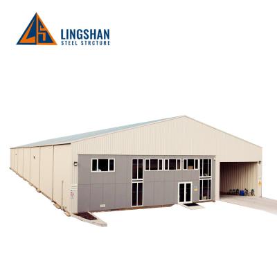 China Parking Lot China Low Cost Steel Structure Cow Farm Building House Shed for sale