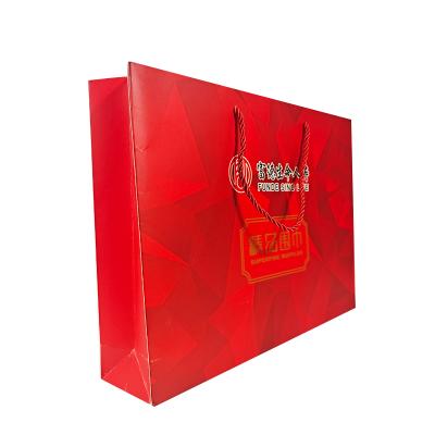 China Top Quality Handmade Packing Machine Widely Used Custom Logo Printed Paper Bags for sale