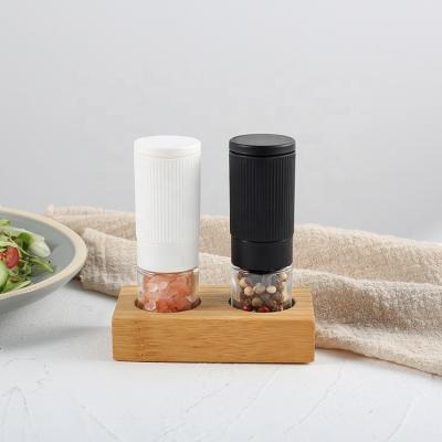 China New Design Viable Mini Ceramic Grinder Pepper Salt and Grinder Spice Set with Glass Jar 25mlx2 and Bamboo Bottom for sale