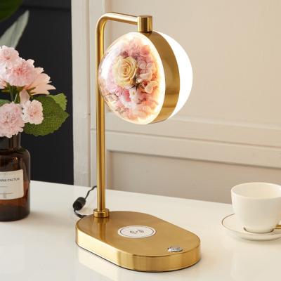 China Beautiful Modern Eternal Life To Spend Flower Desk Lamp With Bedside Smartphone Table Wireless Filling Creative Lamp for sale