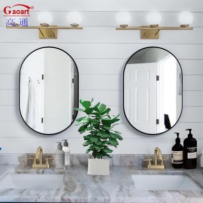 China Bath Mirrors Modern Style Gold Aluminum Framed Large Wall Hanging Oval Bathroom Mirror for sale