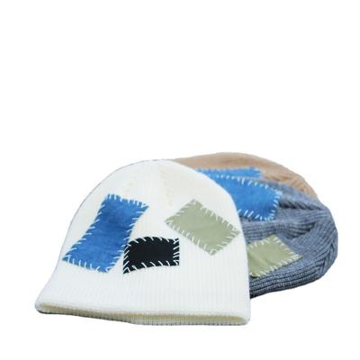 China JOINT Hip Hop Distressed Patch Beanie Hats Fashion Beggar Hat Winter Slapped Hat for sale