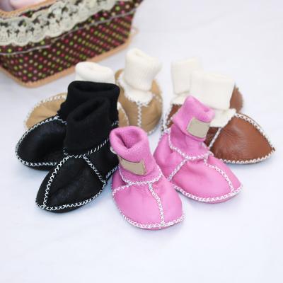 China Real massage baby shoes lambfur baby sock newborn shoes for infant girls and one year old boys for sale