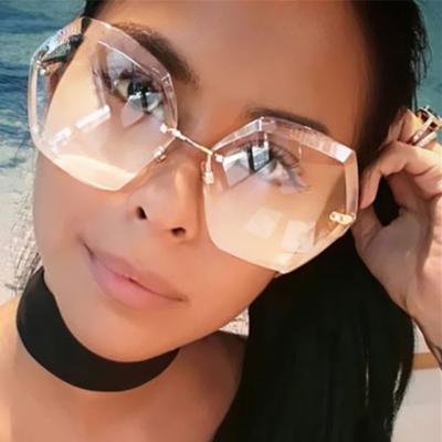 China 2021 Fashion Sun Glasses Sun Glasses China Oversized Women's Lady Rimless Sunglass Ocean UV400 Fashion Sunglasses Factory Wholesale Women's Lady Rimless Sunglass for sale