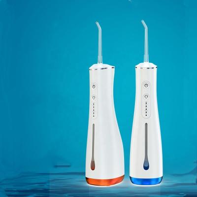 China Teeth Clean and Massage Waterproof Water Flosser, Dental Oral Irrigator for Teeth Portable 1400mah Battery and USB Rechargeable Flosser for sale