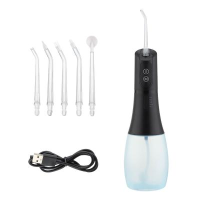 China Teeth Clean and Massage Dental Usb Flosser Jet Floss Tooth Pick Rechargeable New 5 Modes Cordless Oral Irrigator Portable Water 4 Tips 500Ml for sale